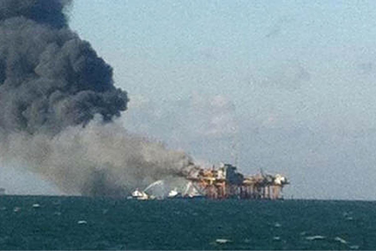 In this image released by a oil field worker and obtained by the Associated Press, a fire burns on a Gulf oil platform Friday, Nov. 16, 2012, after an explosion on the rig, in the Gulf of Mexico off the Louisiana coast. An explosion and fire ripped through a Gulf oil platform Friday as workers used a cutting torch, sending at least four people to a hospital with burns and leaving two missing in waters off Louisiana. (Associated Press)