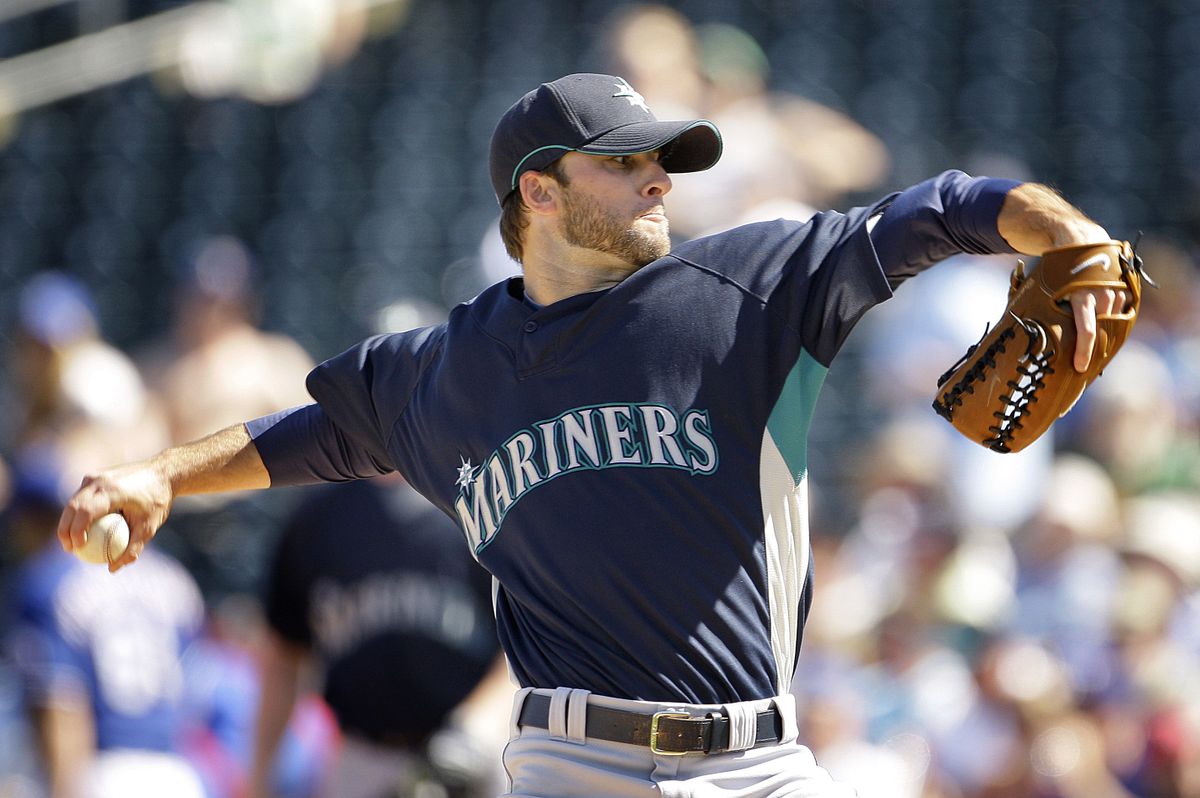 Brandon Morrow finds reading through gadgets fits his lifestyle.  (File Associated Press / The Spokesman-Review)