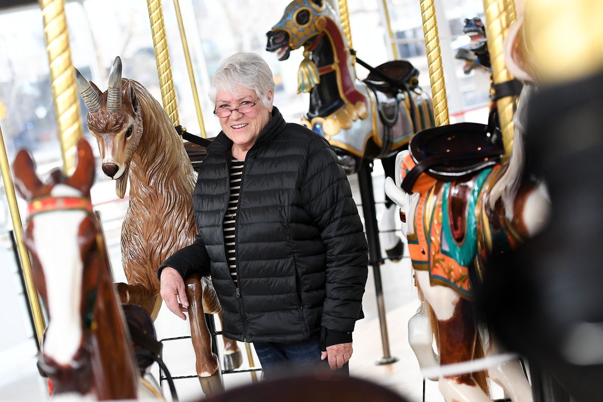 Bette Largent is seen in February at the Looff Carrousel in Riverfront Park. She was a Women of the Year nominee.  (TYLER TJOMSLAND)
