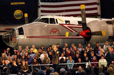 
With an old rescue plane in the background, Hillary Clinton speaks to a crowd in a Missoula Airport hangar Sunday. Associated Press
 (Associated Press / The Spokesman-Review)