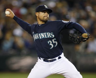 Seattle Mariners starting pitcher Ian Snell throws in the fourth inning of an MLB baseball game against the Los Angeles Angels on June 4, 2010, in Seattle.  (Ted Warren / Associated Press)