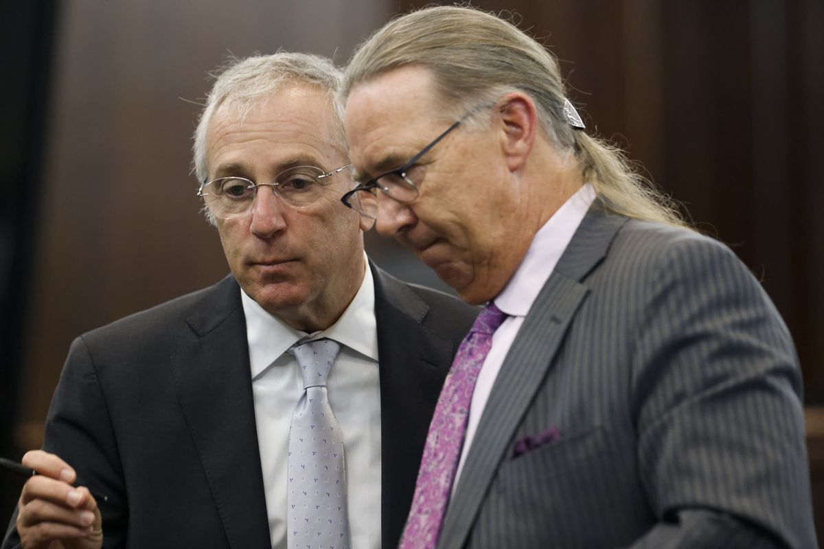 Defense attorneys Franklin Hogue, right, and Robert Rubin confer during jury selection in the trial of William "Roddie" Bryan, Travis McMichael and Gregory McMichael at the Gwynn County Superior Court in Brunswick, Ga., Wednesday, Oct. 27, 2021. The three men are charged with the February 2020 death of 25-year-old Ahmaud Arbery.  (Octavio Jones)