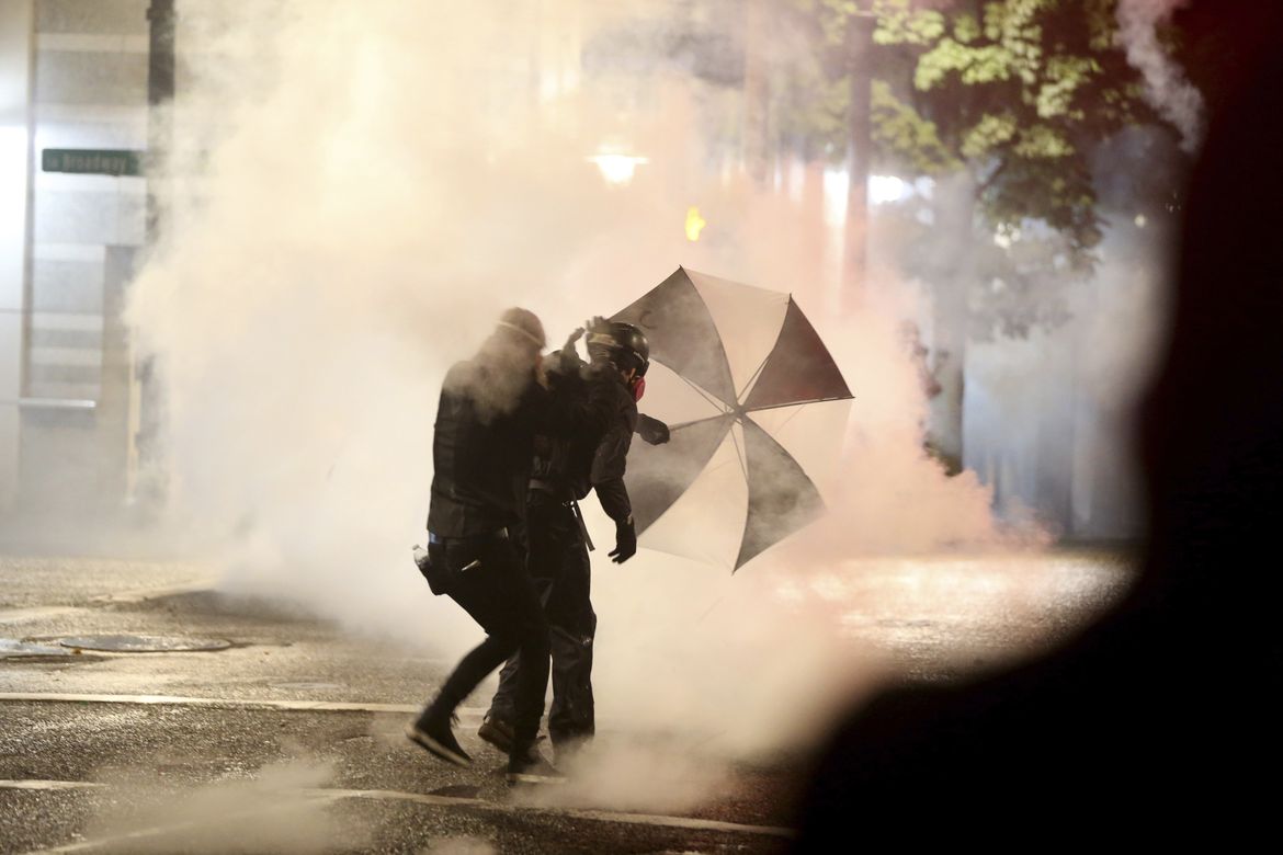 Violence at Portland protest escalates to firebombs, police say | The ...