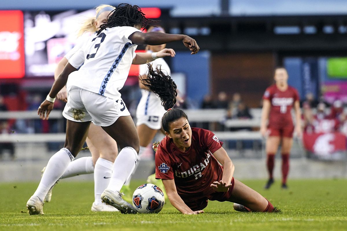 Washington State forward Makamae Gomera-Stevens (3) is fouled by a North Carolina forward Ru Macherera (3) during the first half a 2019 NCAA Women’s College Cup semifinal game on Dec. 6, 2019, at Avaya Stadium in San Jose, California. (Pete Caster / For The Spokesman-Review)
