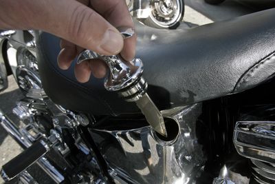 A knife has been customized into what would normally be the dipstick in the oil compartment of a confiscated motorcycle, as seen during a news conference Tuesday in Los Angeles.  (Associated Press / The Spokesman-Review)