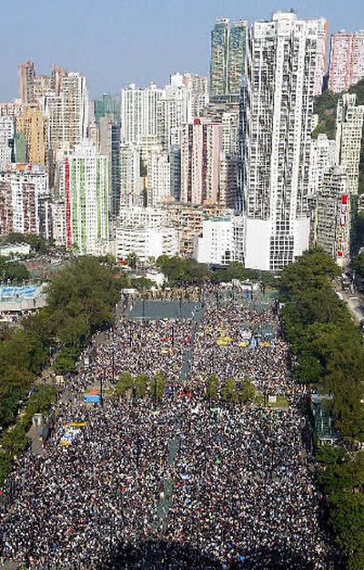 
Tens of thousands of people gather at the Hong Kong Victoria Park before a huge march on Sunday to pressure the government to speed up political reforms that would allow voters to pick the city's leader and entire legislature. 
 (Associated Press / The Spokesman-Review)