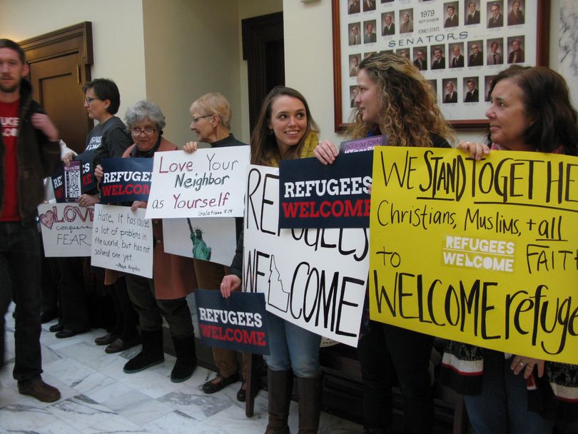 Protesters gather in Idaho Capitol hallway outside scheduled presentation on refugee resettlement featuring two anti-Islam speakers (Betsy Z. Russell)