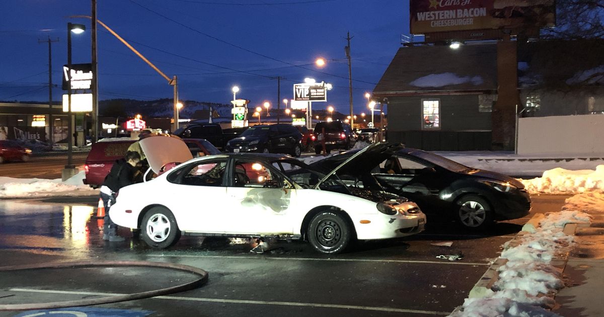 Sparking car catches fire; flames spread to second vehicle The