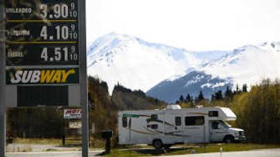 
A recreational vehicle pulls out of a gas station near Anchorage recently. With burgeoning oil prices and an uncertain U.S. economy, Alaska's second-largest private industry may be fortunate to break even with last year's record season. Last summer, more than 1.7 million visitors spent more than $1.5 billion in Alaska, according to the Alaska Travel Industry Association.
 (AP / The Spokesman-Review)