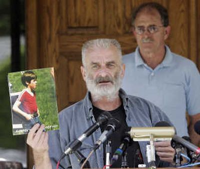 
Ruby Ridge survivor Randy Weaver holds a photo of his son, Sam, as Ed Brown listens in Plainfield, N.H., on Monday. Sam and Weaver's wife were killed in a 1992 North Idaho standoff. Associated Press
 (Associated Press / The Spokesman-Review)