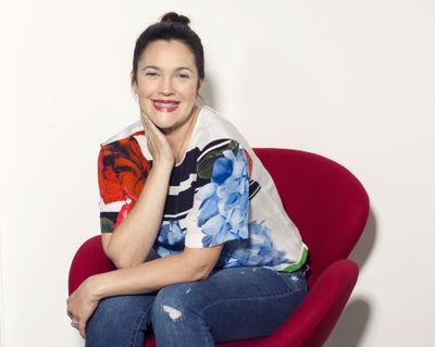 Drew Barrymore is co-owner of the Flower cosmetics line, sold at Wal-Mart. (Associated Press)