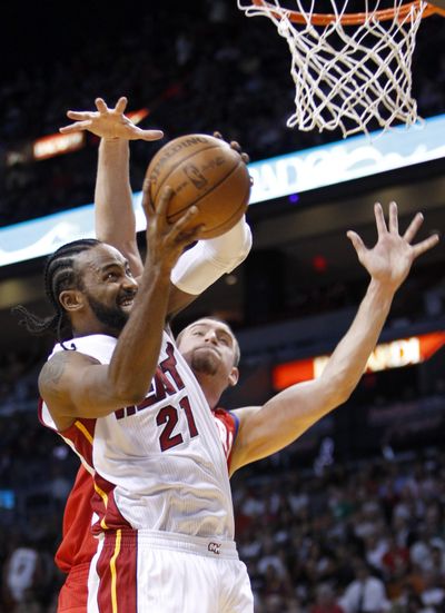 Ronny Turiaf is playing with the star-laden Heat (Wilfredo Lee / Associated Press)
