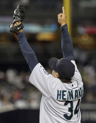 Felix Hernandez celebrates complete game against Yankees. (Associated Press)