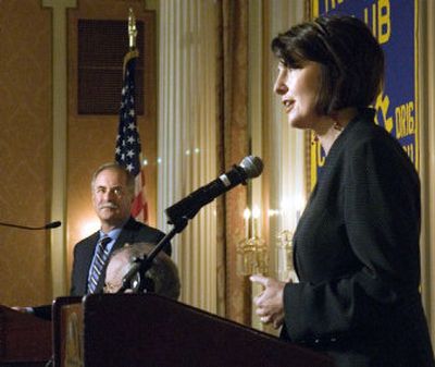 
Republican incumbent 5th District Rep. Cathy McMorris debates her Democratic challenger, Peter Goldmark, during a Spokane Rotary Club meeting at the Spokane Athletic Club on Thursday.
 (Colin Mulvany / The Spokesman-Review)