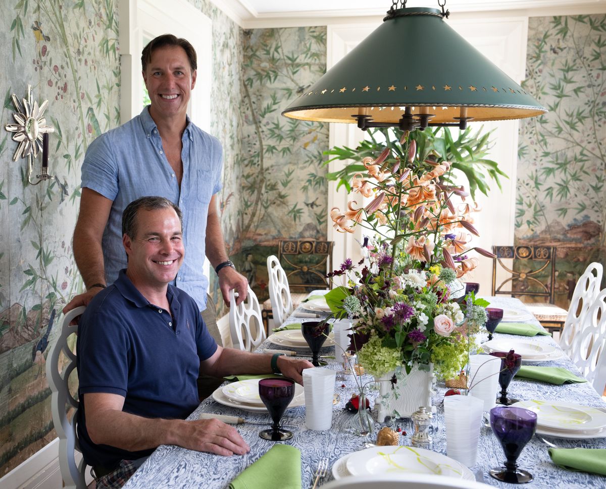 Christopher Spitzmiller, below, and husband Anthony Bellomo at their home, Clove Brook Farm, in Millbrook, N.Y., June 27, 2024. Spitzmiller and Bellomo, owner of Orangerie, a garden shop, offer tips for decorating with flowers at home.  (New York Times)