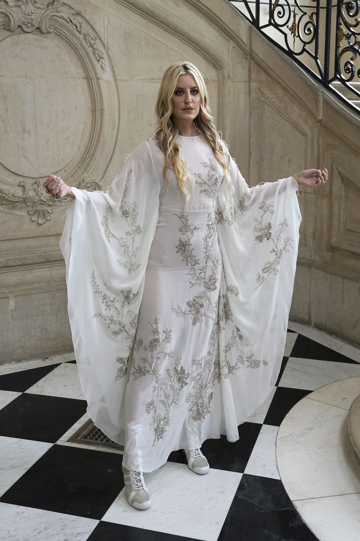 Musician Ioanna Gika poses for photographers prior to the Dior's Haute Couture Fall-Winter 2021-2022 fashion collection presented Monday, July 5, 2021, in Paris.  (Michel Euler)