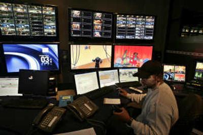 
Eric Devereaux monitors signals transmitted to DirecTV customers at the satellite television company's broadcast center Wednesday in the Marina Del Rey section of Los Angeles. DirecTV said Wednesday its first-quarter earnings rose 10.4 percent, as it acquired more subscribers in the U.S. and Latin America and customers spent more on high-definition and video recording services.  Associated Press
 (Associated Press / The Spokesman-Review)