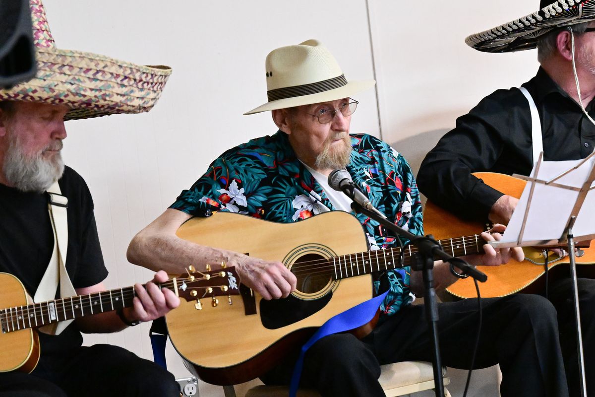 Dale Roberts, center, playing with the Hillyard Belles Show Band performs a Cinco de Mayo show on Friday at the Corbin Senior Center in Spokane.  (Tyler Tjomsland/The Spokesman-Review)