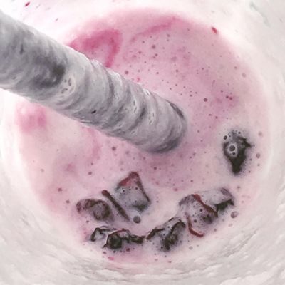 The real deal: huckleberries at the bottom of a huckleberry milkshake at Mary Lou’s Milk Bottle in Spokane’s Garland District. (Adriana Janovich)