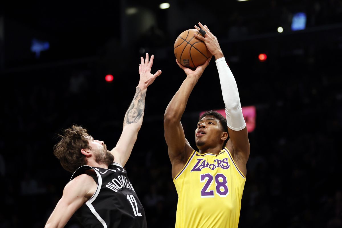 Rui Hachimura #28 of the Los Angeles Lakers goes to the basket as Joe Harris #12 of the Brooklyn Nets defends during the first half at Barclays Center on January 30, 2023 in the Brooklyn borough of New York City.   (Getty Images)