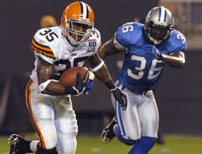 
Jerome Harrison of the Cleveland Browns outruns Detroit Lions safety Vernon Fox on a 31-yard TD reception. 
 (Associated Press / The Spokesman-Review)
