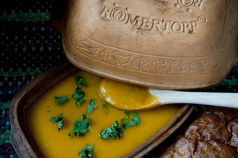 Romertopf clay pots are best known for cooking meats, but they also turn out delicious soups, like this butternut squash and apple soup pictured above. The pot also does an amazing job making bread and meat dishes. (Dan Pelle)