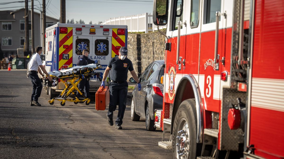 Emergency personnel leave the scene after a 5-year-old autistic boy, who went missing over night in the West Central Neighborhood, was found safe. Xavier Jones was located in an unlocked car in the neighborhood just before 9 a.m. Thursday.  (COLIN MULVANY/THE SPOKESMAN-REVI)