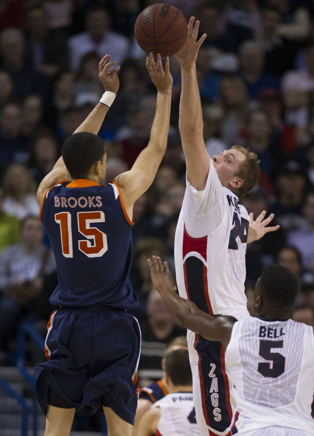 Gonzaga Bulldogs center Przemek Karnowski blocks a shot by Pepperdine Waves guard Malcolm Brooks. (Colin Mulvany)