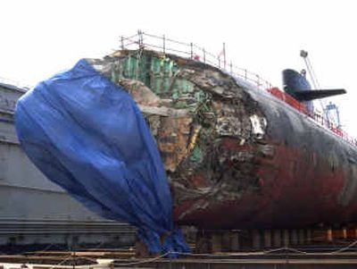 
In this photo released by the U.S. Navy, the Los Angeles-class fast-attack submarine USS San Francisco sits in a dry dock in Santa Rita, Guam, on Jan. 27 for a damage assessment after running aground on Jan. 8. 
 (Associated Press / The Spokesman-Review)