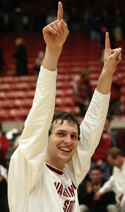 Washington State guard Nikola Koprivica signals to the crowd after Washington State defeated Portland State 72-60 in a college basketball game Sunday, Dec. 9, 2007, at Beasley Coliseum in Pullman, Wash. (AP Photo/Dean Hare) ORG XMIT: WADH110 (Dean Hare / The Spokesman-Review)