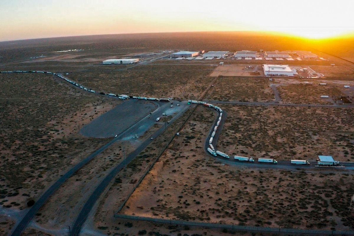 Truckers block the entrance into the Santa Teresa Port of Entry in Ciudad Juarez going into New Mexico on April 12, 2022. The truckers blocked the port as a protest to the prolonged processing times implemented by Gov. Abbott which they say have increased from 2-3 hours up to 14 hours in the last few days.  (Omar Ornelas)