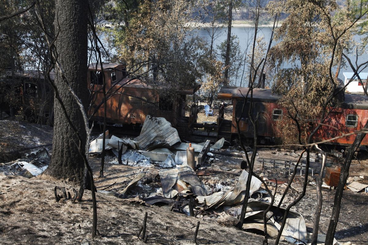 Burned structures after a wildfire near Sorrento, British Columbia, Canada, on Aug. 26. British Columbia is experiencing the most destructive wildfire season on record, with an area nearly the size of New Jersey already burned.    (Jen Osborne/Bloomberg)