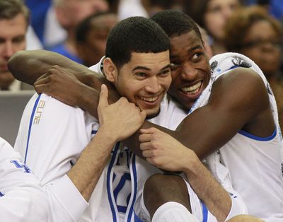 UK's Eloy Vargas, left, Michael Kidd-Gilchrist celebrate. (Associated Press)