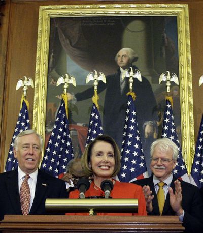 House Speaker Nancy Pelosi is joined by  House Majority Leader Steny Hoyer, left, and Rep. George Miller, D-Calif.,  on Saturday in Washington.  (Associated Press / The Spokesman-Review)