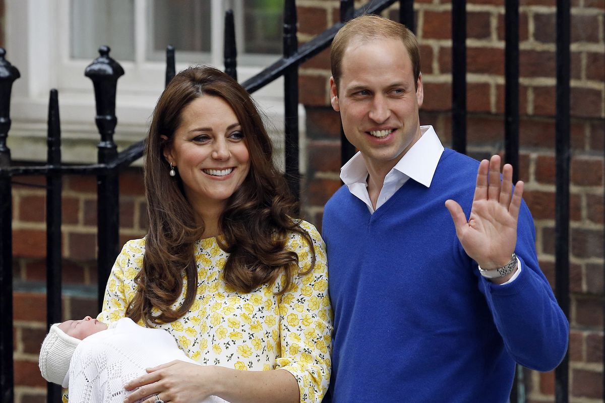Britain’s Prince William and Kate, Duchess of Cambridge, leave St. Mary’s Hospital on Saturday with their baby girl, born in the morning. (Associated Press)