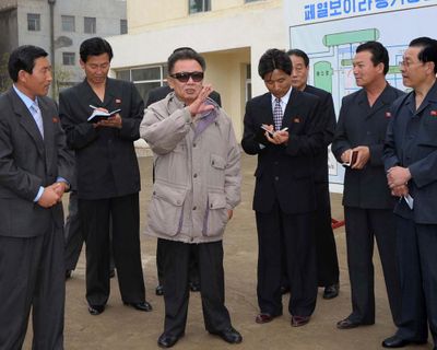 In this undated photo released Saturday, North Korean leader Kim Jong-il gestures as he inspects a factory in Tanchon,  near Pyongyang, North Korea.  (Associated Press / The Spokesman-Review)