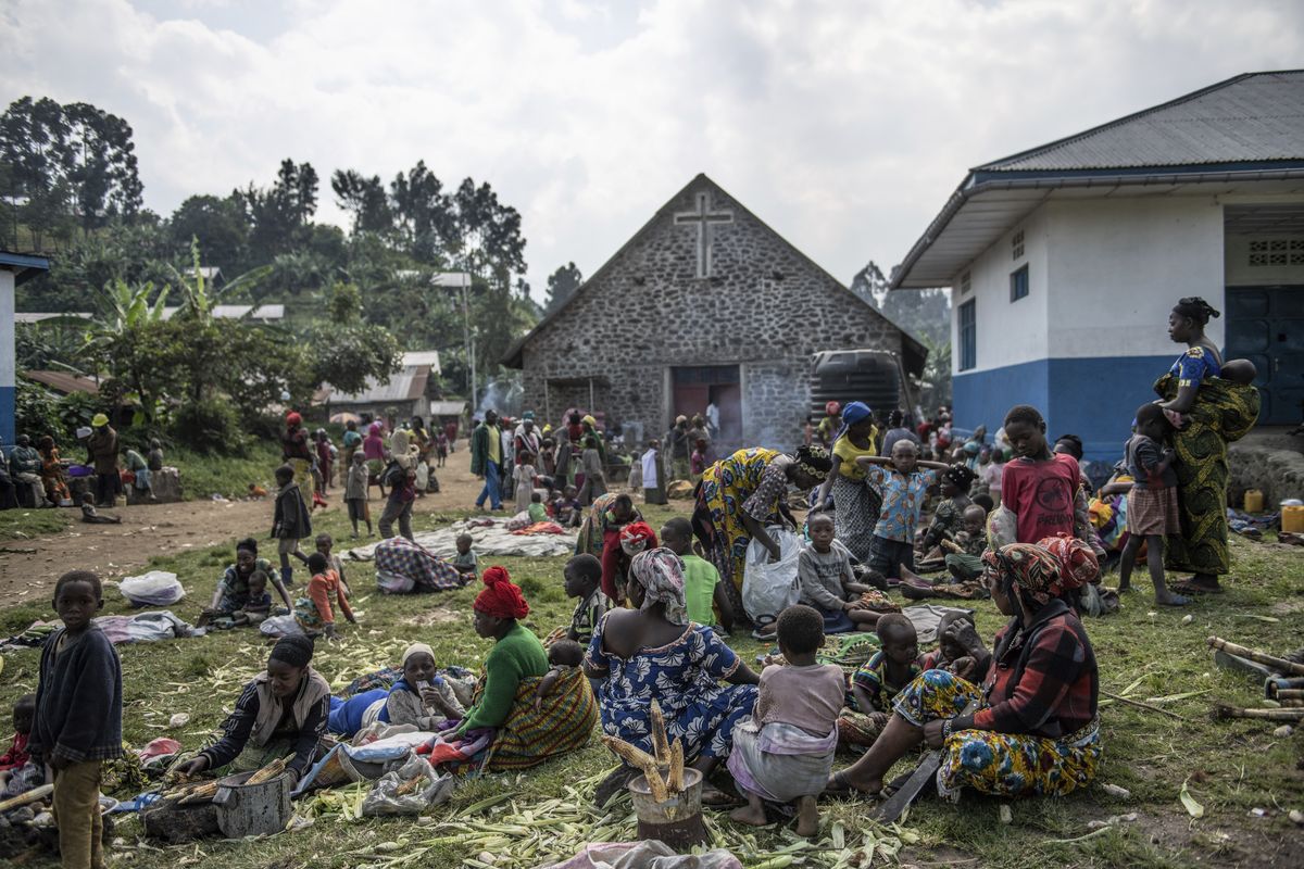 People fleeing the fighting between M23 forces and Congolese army find refuge in a church in Kibumba, north of Goma, Democratic Republic of Congo, Friday Jan. 28, 2022. In the past week, inhabitants from six villages in the country