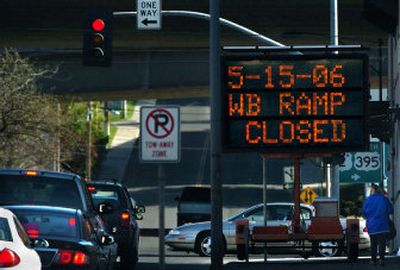 
Construction will begin May 15 on the I-90 viaduct in downtown Spokane, affecting several on-ramps and exits and reducing the interstate to two lanes in each direction. Crews are preparing the public with signs, like this one on Division Street. 
 (Holly Pickett / The Spokesman-Review)