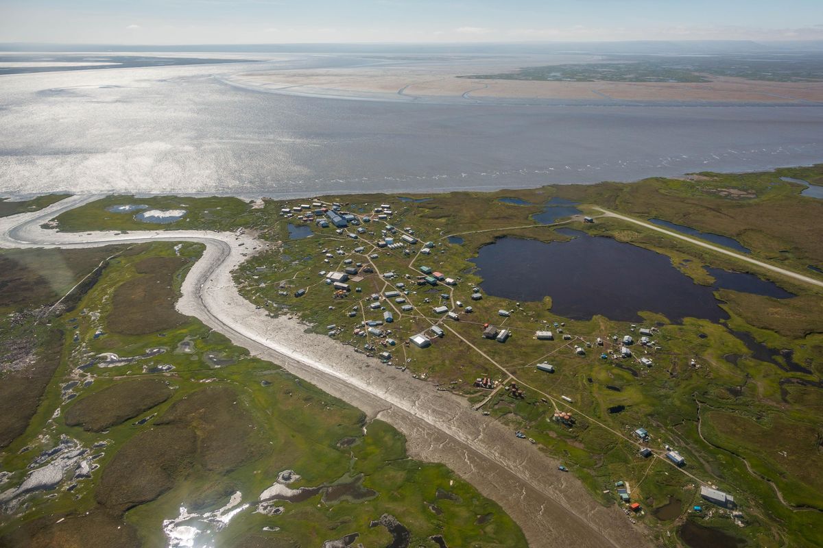 The village of Newtok in western Alaska is viewed Aug. 4, 2015. The state is hoping to kick-start a mass exodus from the tiny village through a national competition for states and local governments vying for a slice of nearly $1 billion in grants to be awarded by the U.S. Department of Housing and Urban Development. (Loren Holmes / Associated Press)