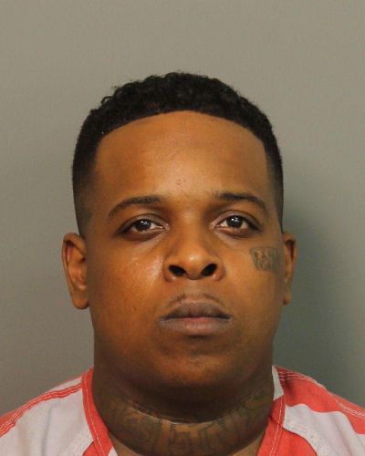This Sunday, July 2, 2017 photo provided by the Jefferson County Sheriff shows Ricky Hampton, also known as Finese2Tymes, who was arrested in Alabama early Sunday, a day after a shooting at one of his concerts in Little Rock, Ark., the U.S. Marshal Service said. (Jefferson County Sheriff)