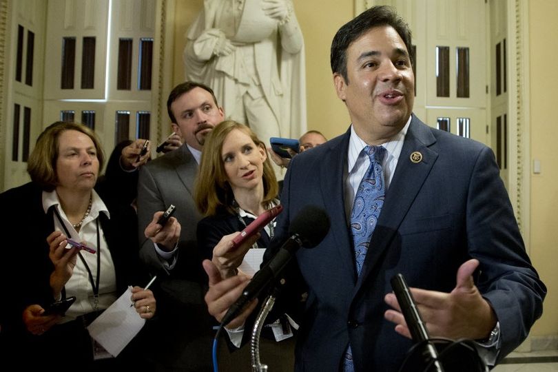 Freedom Caucus member Rep. Raul Labrador, R-Idaho, speaks to reporters on Capitol Hill in Washington, Wednesday, after a meeting with Rep. Paul Ryan, R-Wis. Ryan seeking unity in a place it's rarely found, is telling House Republicans he will serve as their speaker only if they embrace him by week's end as their consensus candidate. (AP Photo/Manuel Balce Ceneta)
