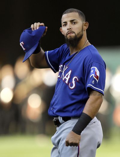 Texas Rangers' Rougned Odor removes his cap prior to a baseball game against Oakland. (Ben Margot / Associated Press)