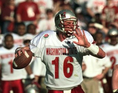 Washington State's Ryan Leaf looks downfield for a receiver in the first quarter of the 84th Rose Bowl in Pasadena, Calif., Jan. 1, 1998. (ERIC DRAPER / Associated Press)