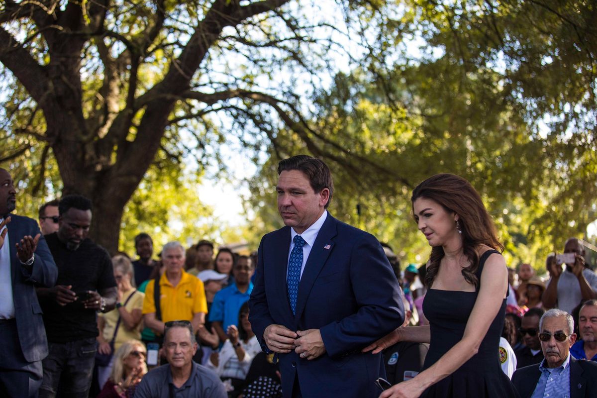 Florida Gov. Ron DeSantis and his wife attend an Aug. 27, 2023, vigil to honor the victims of a deadly shooting in Jacksonville, Fla. MUST CREDIT: Saul Martinez for The Washington Post.  (Saul Martinez/For The Washington Post)