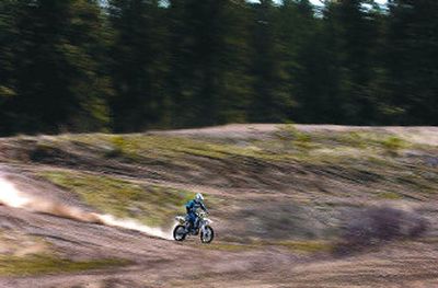 
Konnrad Kuest kicks up dust during a recent practice at the Seven Mile Off Road Vehicle Park in Spokane. 
 (photos by Brian Plonka | The spokesman-review / The Spokesman-Review)