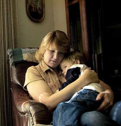 
Nicholas Ashby, 3, snuggles with his mom, Mary Ann Mattson, last fall. 
 (File/ / The Spokesman-Review)