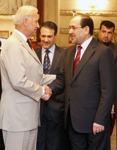 Vice President Joe Biden speaks with Iraqi Prime Minister Nouri al-Maliki in Baghdad on Sunday.  (Associated Press)