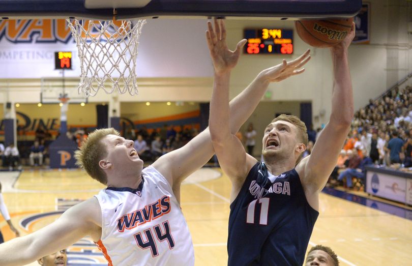 Gonzaga forward Domantas Sabonis, right, shoots as Pepperdine center Ryan Keenan defends during the first half of the WCC game on Feb. 6, 2016, in Malibu, Calif. (Mark J. Terrill / AP)
