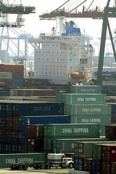 
Cargo containers are seen at the Los Angeles Port in Los Angeles. The trade deficit swelled to an all-time high of $46 billion in March as a stronger U.S. economy stoked Americans' appetite for foreign-made cars, TVs and other goods. 
 (File/Associated Press / The Spokesman-Review)