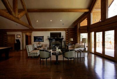 
Light pours in through soaring windows in the Gellers' living room, where antiques and lush upholstery from their Century City, Calif., home fit right in. 
 (Los Angeles Times / The Spokesman-Review)